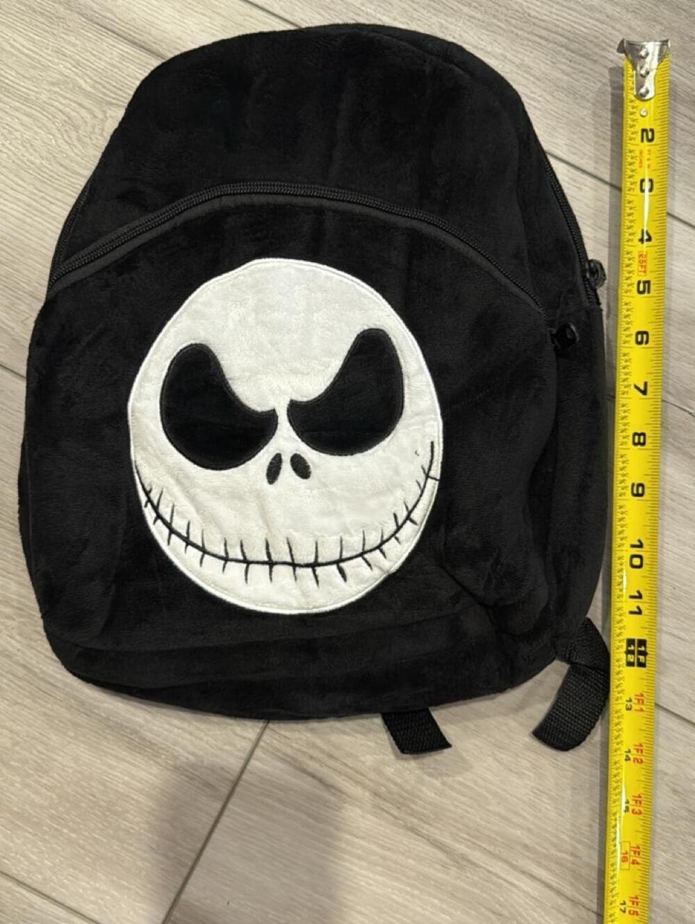 Black Plush Backpack with Jack Skellington Face Design